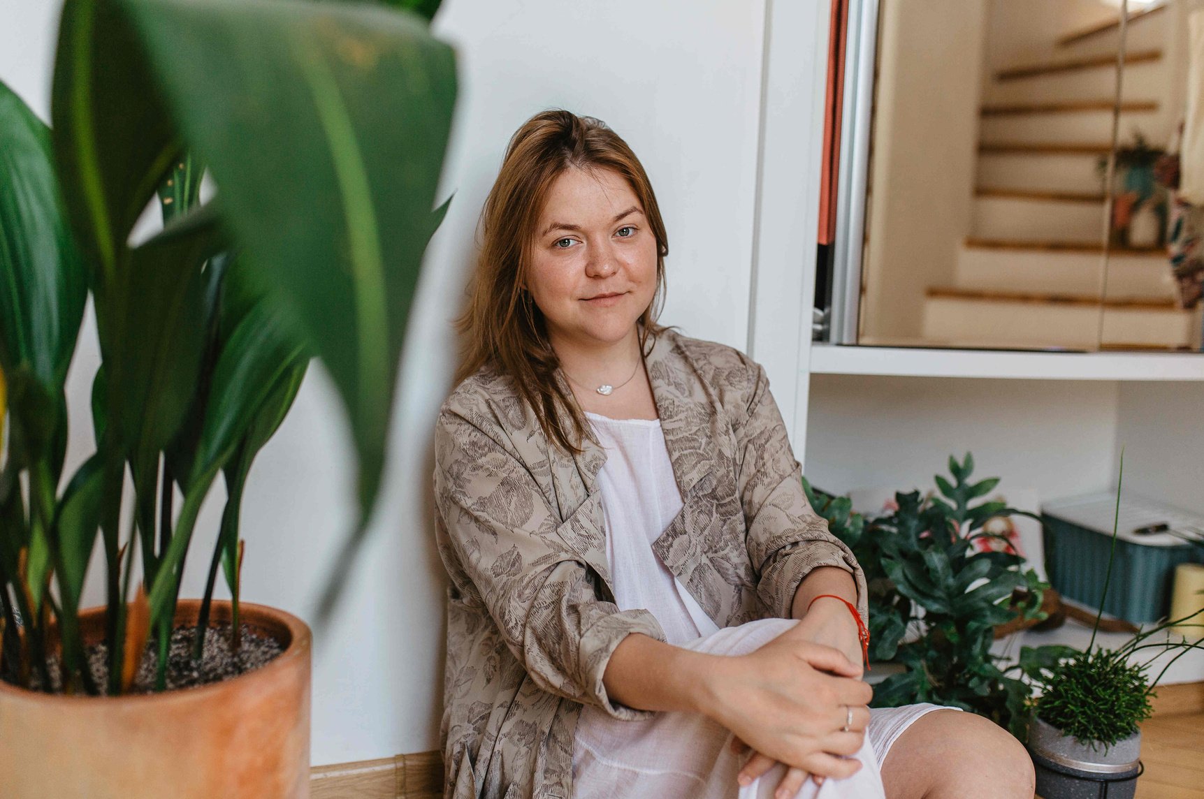 Woman Sitting on the Floor at Home